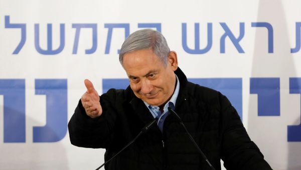 Israeli Prime Minister Benjamin Netanyahu gestures as he speaks during an event marking Tu BiShvat, the Jewish Arbor Day, in the Israeli settlement of Mevo'ot Yericho, in the Israeli-occupied West Bank February 10, 2020 - Sputnik International