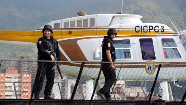 Security forces guard the heliport of the Board of Scientific, Penitentiary and Criminal Investigations (CICPC), before the deportation of drug trafficker (File) - Sputnik International