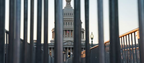 The U.S. Capitol building exterior is seen at sunset as members of the Senate participate in the first day of the impeachment trial of President Donald Trump in Washington, U.S., January 21, 2020. - Sputnik International