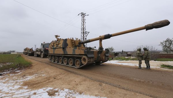 Turkish military convoy is seen near the town of Idlib, Syria, Wednesday, Feb. 12, 2020 - Sputnik International
