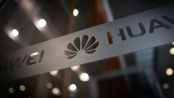 A Huawei logo is seen at a Huawei production base during a media tour in Donggguan, China's Guangdong province on March 6, 2019 A Huawei logo is seen at a Huawei production base during a media tour in Donggguan, China's Guangdong province on March 6, 2019 - Sputnik International