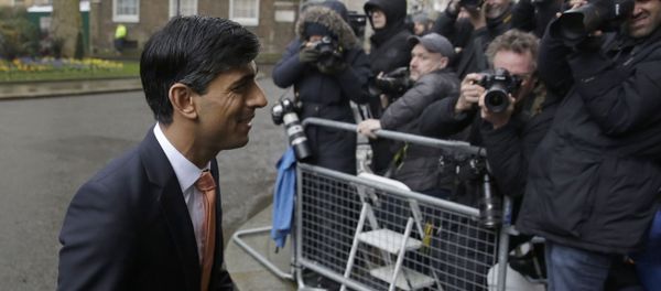 British lawmaker Rishi Sunak, and Chancellor of the Exchequer leaves 10 Downing Street, where he was given the job by Britain's Prime Minister Boris Johnson, as the former Chancellor Sajid Javid, resigned, in London, Thursday, Feb. 13, 2020 - Sputnik International