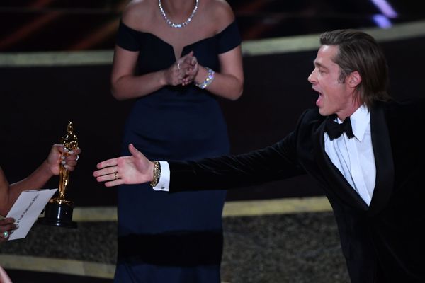 US actor Brad Pitt accepts the award for Best Actor in a Supporting Role for Once upon a Time...in Hollywood from US actress Regina King (L) during the 92nd Oscars at the Dolby Theatre in Hollywood, California on February 9, 2020. US actor Brad Pitt accepts the award for Best Actor in a Supporting Role for Once upon a Time...in Hollywood from US actress Regina King (L) during the 92nd Oscars at the Dolby Theatre in Hollywood, California on February 9, 2020. - Sputnik International