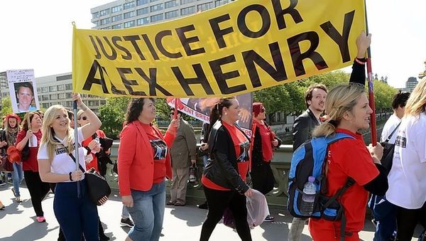 Charlotte Henry holding a placard during a Joint Enterprise demonstration in London - Sputnik International