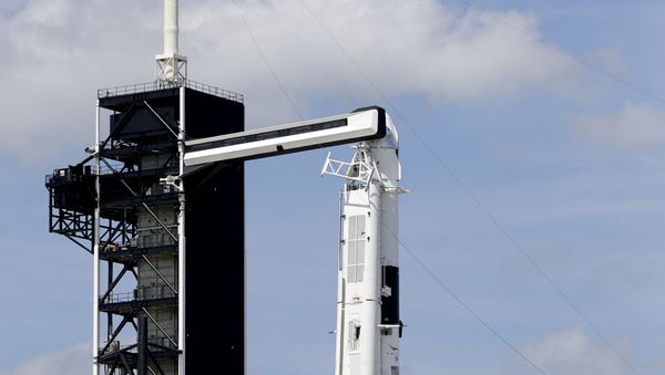 A Falcon 9 SpaceX rocket, ready for launch, sits on pad 39A at the Kennedy Space Center in Cape Canaveral - Sputnik International