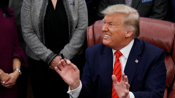 U.S. President Donald Trump reacts to a question from a reporter - Sputnik International