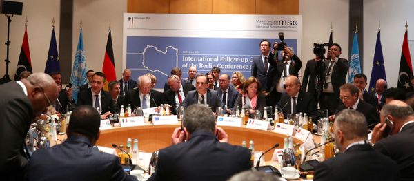 Members of the international committee take their seats for a follow-up meeting on Libya, arranged by German Foreign Minister Heiko Maas, in Munich, Germany February 16, 2020 - Sputnik International
