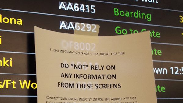 Travellers reported chaotic scenes at Heathrow on 16 February 2020 as departure boards and check-in systems stopped working - Sputnik International