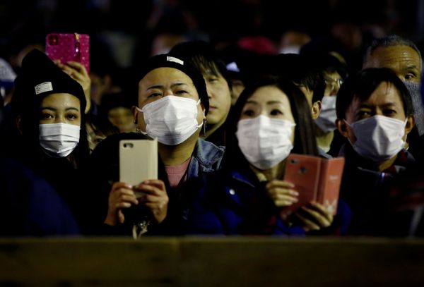 People in protective masks, during the outbreak of the novel coronavirus, watch a naked festival People in protective masks, during the outbreak of the novel coronavirus, watch a naked festival - Sputnik International