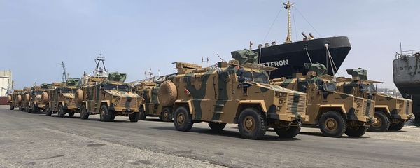 A photo posted on the Facebook Page of the media bureau of the Volcano of Anger operation on 18 May 2019, reportedly shows Turkish-made armoured personnel vehicles, shipped to Libya's internationally recognised Government of National Accord (GNA), arriving at Tripoli port A photo posted on the Facebook Page of the media bureau of the Volcano of Anger operation on 18 May 2019, reportedly shows Turkish-made armoured personnel vehicles, shipped to Libya's internationally recognised Government of National Accord (GNA), arriving at Tripoli port - Sputnik International