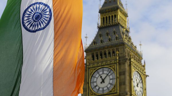 An Indian Flag hangs near the London landmark Big Ben in Parliament Square in London, Thursday, Nov. 12, 2015. Indian Prime Minister Narendra Modi is in Britain for a three day visit. - Sputnik International
