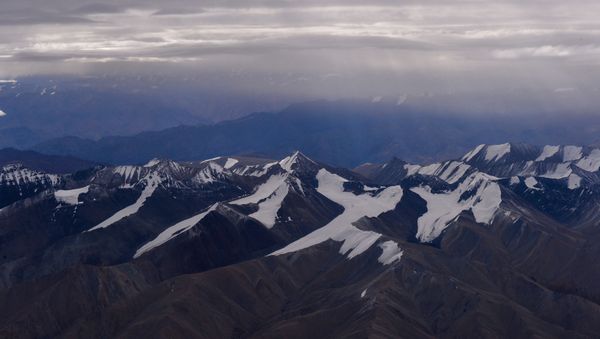 This photograph taken on August 22, 2016, shows a general view of the Himalayan Mountain Range in Ladakh in the northern state of Jammu and Kashmir.  - Sputnik International