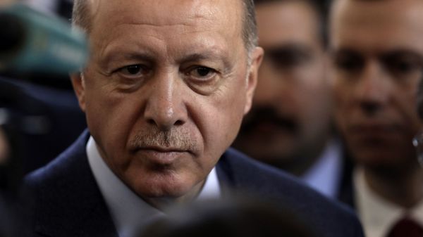 Turkish President Recep Tayyip Erdogan speaks to journalists at parliament, in Ankara, Turkey, Wednesday, Feb. 19, 2020. Erdogan said on Wednesday that time was running up for Syrian government forces to retreat from Syria's northwestern Idlib province and warned of an imminent Turkish intervention to force the retreat. Turkish President Recep Tayyip Erdogan speaks to journalists at parliament, in Ankara, Turkey, Wednesday, Feb. 19, 2020. Erdogan said on Wednesday that time was running up for Syrian government forces to retreat from Syria's northwestern Idlib province and warned of an imminent Turkish intervention to force the retreat. - Sputnik International