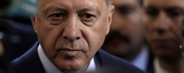 Turkish President Recep Tayyip Erdogan speaks to journalists at parliament, in Ankara, Turkey, Wednesday, Feb. 19, 2020. Erdogan said on Wednesday that time was running up for Syrian government forces to retreat from Syria's northwestern Idlib province and warned of an imminent Turkish intervention to force the retreat. - Sputnik International