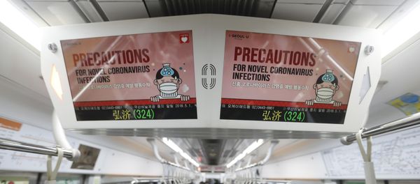 Electric screens about precautions against the illness COVID-19 are seen in a subway train in Seoul, South Korea, Monday, Feb. 17, 2020. Chinese authorities on Monday reported a slight upturn in new virus cases and 105 more deaths for a total of 1,770 since the outbreak began two months ago Electric screens about precautions against the illness COVID-19 are seen in a subway train in Seoul, South Korea, Monday, Feb. 17, 2020. Chinese authorities on Monday reported a slight upturn in new virus cases and 105 more deaths for a total of 1,770 since the outbreak began two months ago - Sputnik International