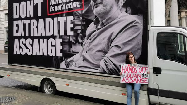 Protesters gather outside Australia House in London on Saturday for a rally in support of WikiLeaks founder Julian Assange ahead of extradition hearings. - Sputnik International
