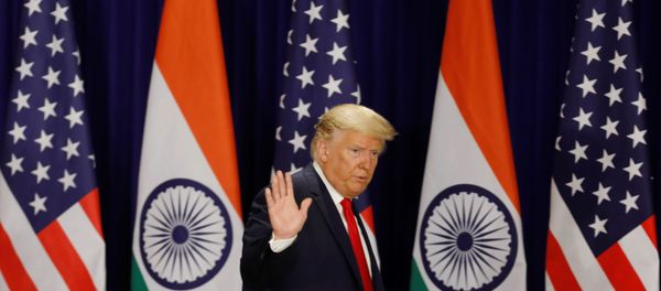 U.S. President Donald Trump waves as he leaves after a news conference in New Delhi, India, February 25, 2020 - Sputnik International