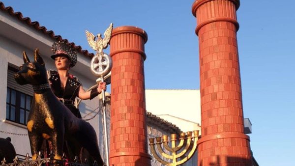 A woman is seen standing on a carnival float depicting Third Reich eagle symbol, Menorah candle holder and crematorium chimneys, during a carnival parade in Campo De Criptana, Ciudad Real Province, Spain February 24, 2020 in this picture obtained from social media - Sputnik International
