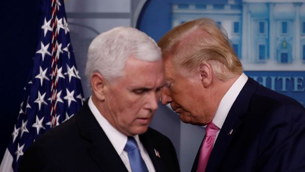 U.S. President Donald Trump walks past Vice President Mike Pence during a news conference at the White House in Washington, U.S., February 26, 2020. REUTERS/Carlos Barria U.S. President Donald Trump walks past Vice President Mike Pence during a news conference at the White House in Washington, U.S., February 26, 2020. REUTERS/Carlos Barria - Sputnik International