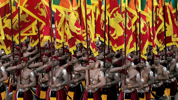 Sri Lanka's military march with national flags during the 72nd independence day ceremony, in Colombo, Sri Lanka February 4, 2020 - Sputnik International