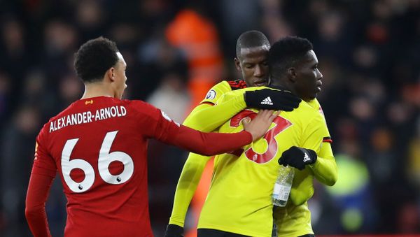 Soccer Football - Premier League - Watford v Liverpool - Vicarage Road, Watford, Britain - February 29, 2020  Liverpool's Trent Alexander-Arnold clashes with Watford's Ismaila Sarr and Abdoulaye Doucoure  - Sputnik International