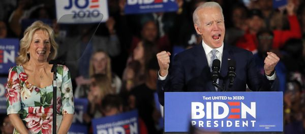 Democratic presidential candidate former Vice President Joe Biden, accompanied by his wife Jill Biden, speaks at a primary night election rally in Columbia, S.C., Saturday, Feb. 29, 2020. - Sputnik International