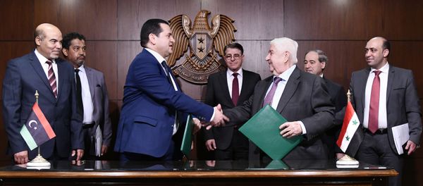 In this photo released by the Syrian official news agency SANA, Syrian Foreign Minister Walid al-Moallem, third right, meets with officials from Libya's east-based government, in Damascus, Syria, Sunday, March 1, 2020. - Sputnik International