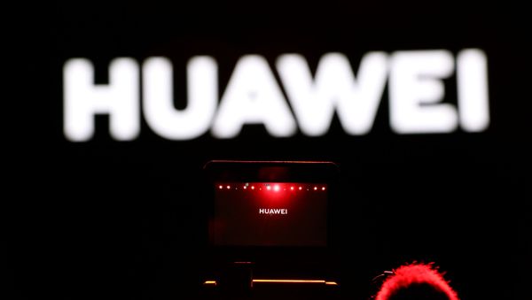 A cameraman records during Huawei stream product launch event in Barcelona, Spain February 24, 2020. A cameraman records during Huawei stream product launch event in Barcelona, Spain February 24, 2020. - Sputnik International