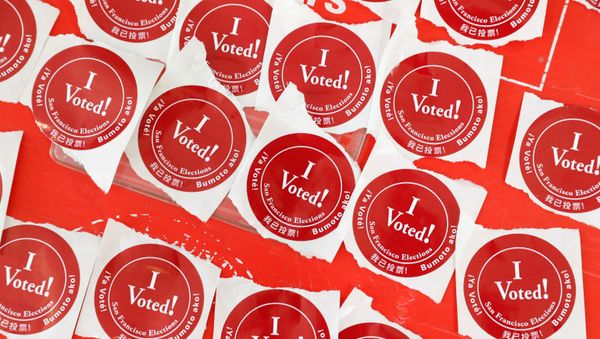 A table of “I voted!” stickers are seen at a polling station as voters cast their ballots for the presidential primary election on Super Tuesday in San Francisco, California, U.S. March 3, 2020 - Sputnik International