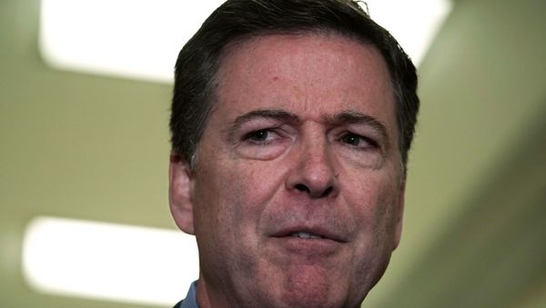 Former Federal Bureau of Investigation Director James Comey speaks to members of the media at the Rayburn House Office Building after testifying to the House Judiciary and Oversight and Government Reform committees on Capitol Hill December 07, 2018 in Washington, DC - Sputnik International
