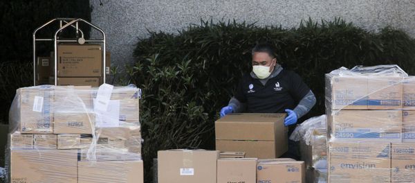 A worker organizes a delivery at the Life Care Center of Kirkland, the long-term care facility linked to several confirmed coronavirus cases in the state, in Kirkland, Washington, U.S. March 4, 2020 A worker organizes a delivery at the Life Care Center of Kirkland, the long-term care facility linked to several confirmed coronavirus cases in the state, in Kirkland, Washington, U.S. March 4, 2020 - Sputnik International