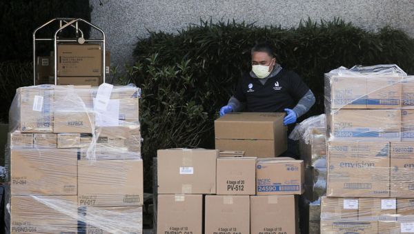 A worker organizes a delivery at the Life Care Center of Kirkland, the long-term care facility linked to several confirmed coronavirus cases in the state, in Kirkland, Washington, U.S. March 4, 2020 A worker organizes a delivery at the Life Care Center of Kirkland, the long-term care facility linked to several confirmed coronavirus cases in the state, in Kirkland, Washington, U.S. March 4, 2020 - Sputnik International