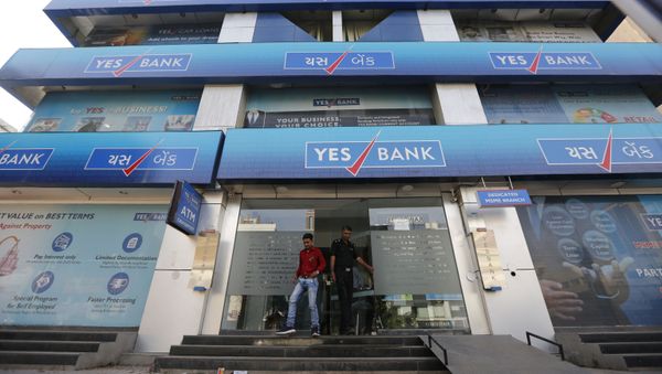 An Indian man walks out of a Yes Bank building in Ahmadabad, India An Indian man walks out of a Yes Bank building in Ahmadabad, India - Sputnik International