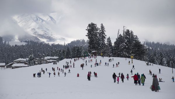 People ski on a slop in Gulmarg, 55 kilometers (34 miles) north of Srinagar, Indian controlled Kashmir, Wednesday, Jan. 9, 2019 - Sputnik International