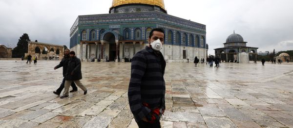 A man wears a face mask in Jerusalem's Old City A man wears a face mask in Jerusalem's Old City - Sputnik International