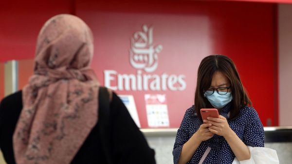 FILE PHOTO: A traveller wears a mask at Dubai International Airport, after the UAE's Ministry of Health and Community Prevention confirmed the country's first case of coronavirus, in Dubai, United Arab Emirates January 29, 2020. - Sputnik International
