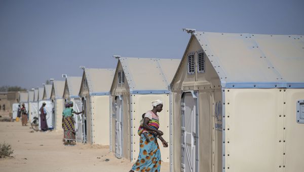 In this photo taken on Tuesday, Dec. 10, 2019 displaced Burkinabe people in the Pissila town camp, near Kaya, Burkina Faso. Islamic extremists carried out a record number of attacks last year in Burkina Faso and the instability has now spread to the country's east. The violence in northern and now eastern Burkina Faso has displaced more than half a million people, according to the United Nations. And there are fears the unrest could throw elections planned for late 2020 into question. - Sputnik International