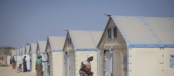 In this photo taken on Tuesday, Dec. 10, 2019 displaced Burkinabe people in the Pissila town camp, near Kaya, Burkina Faso. Islamic extremists carried out a record number of attacks last year in Burkina Faso and the instability has now spread to the country's east. The violence in northern and now eastern Burkina Faso has displaced more than half a million people, according to the United Nations. And there are fears the unrest could throw elections planned for late 2020 into question. - Sputnik International
