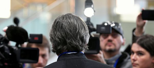 Peter Langstraat, lawyer representing victims' families, talks to the media after a Dutch court opened the criminal trial against four suspects in the July 2014 downing of Malaysia Airlines flight MH17, in Badhoevedorp, Netherlands March 9, 2020. REUTERS/Piroschka Van De Wouw - Sputnik International