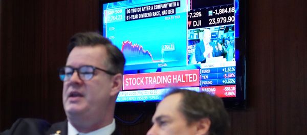 Traders work on the floor of the New York Stock Exchange (NYSE) in New York, U.S., March 9, 2020 Traders work on the floor of the New York Stock Exchange (NYSE) in New York, U.S., March 9, 2020 - Sputnik International
