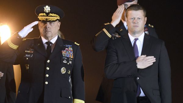 Army Chief of Staff Gen. Mark Milley, left, and Secretary of the Army Ryan McCarthy, stand as an Army carry team, not pictured, moves a transfer case containing the remains of Spc. Michael I. Nance at Dover Air Force Base, Del., on Wednesday, July 31, 2019. - Sputnik International