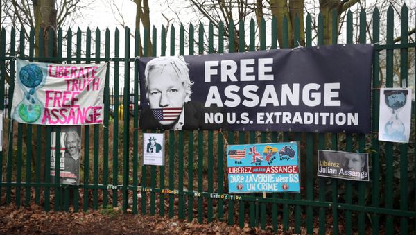 Posters of support hang outside Woolwich Crown Court, ahead of a hearing to decide whether WikiLeaks founder Julian Assange should be extradited to the United States, in London, Britain, February 24, 2020 Posters of support hang outside Woolwich Crown Court, ahead of a hearing to decide whether WikiLeaks founder Julian Assange should be extradited to the United States, in London, Britain, February 24, 2020 - Sputnik International