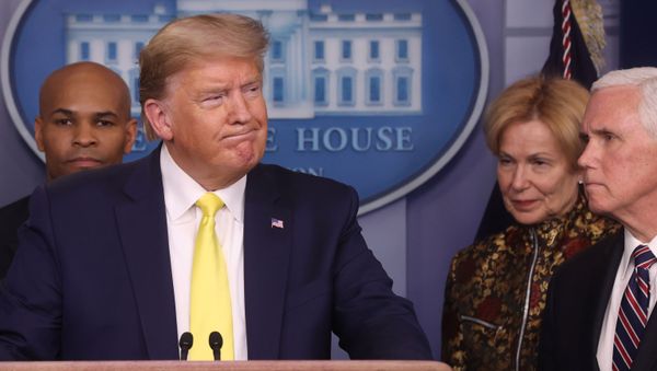 U.S. President Donald Trump, flanked by ‪Vice President Mike Pence‬, arrives for a press briefing on the administration response to the Coronavirus, at the White House in Washington, U.S. March 9, 2020. - Sputnik International