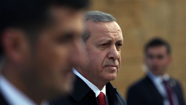 Turkish President Recep Tayyip Erdogan is surrounded by his bodyguards as he walks to the mausoleum of Turkey's founder Mustafa Kemal Ataturk on Republic Day in Ankara, Turkey. File photo  - Sputnik International