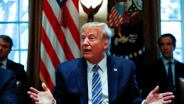 U.S. President Donald Trump delivers remarks to the news media during a meeting with bankers on COVID-19 coronavirus response, inside the Cabinet Room at the White House in Washington, U.S., March 11, 2020 - Sputnik International