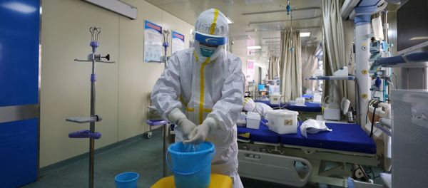 Medical workers in protective suits disinfect an intensive care unit (ICU) ward of Union Jiangbei Hospital in Wuhan, the epicentre of the novel coronavirus outbreak, Hubei province, China March 12, 2020. Picture taken March 12, 2020 Medical workers in protective suits disinfect an intensive care unit (ICU) ward of Union Jiangbei Hospital in Wuhan, the epicentre of the novel coronavirus outbreak, Hubei province, China March 12, 2020. Picture taken March 12, 2020 - Sputnik International