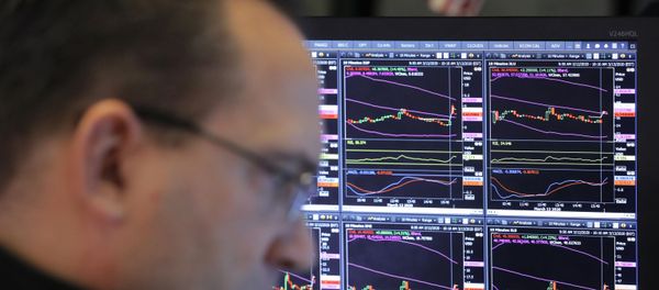 A trader works on the floor of the New York Stock Exchange (NYSE) after the opening bell of the trading session in New York, U.S., March 13, 2020 A trader works on the floor of the New York Stock Exchange (NYSE) after the opening bell of the trading session in New York, U.S., March 13, 2020 - Sputnik International