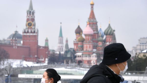 Tourists in Masks in Moscow Tourists in Masks in Moscow - Sputnik International