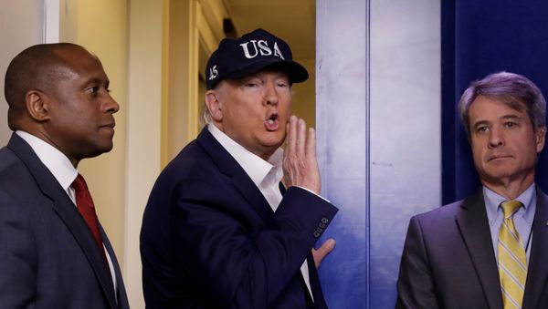 U.S. President Donald Trump speaks as he leaves after a press briefing with members of the Coronavirus Task Force at the White House in Washington, U.S., March 14, 2020 - Sputnik International