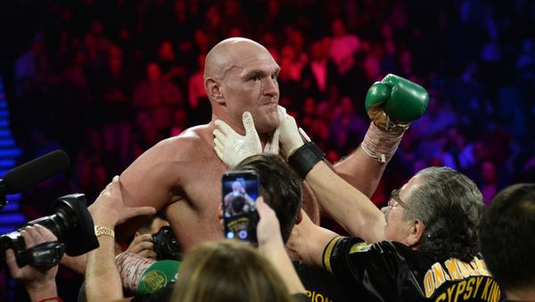 Tyson Fury celebrates after defeating Deontay Wilder in their WBC heavyweight title bout - Sputnik International